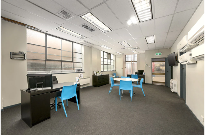 Office interior with wall mounted split system air conditioners